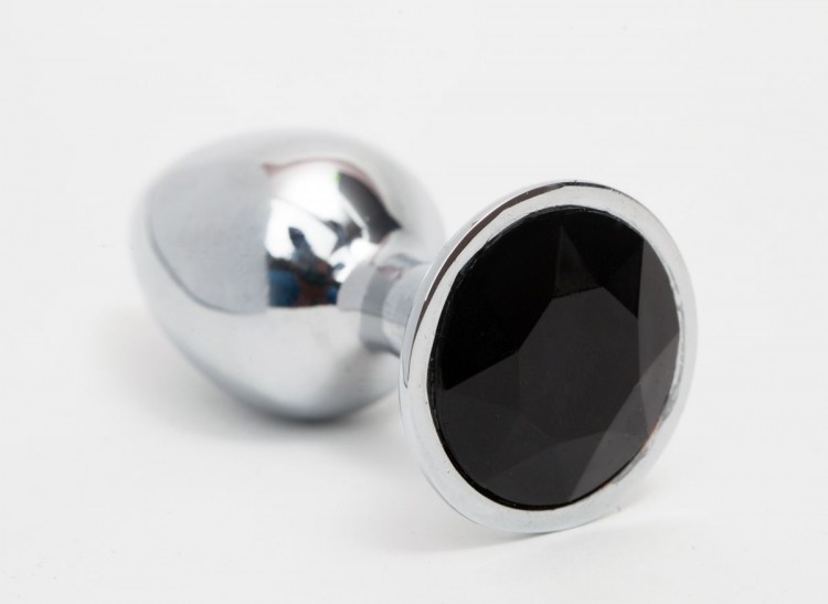 Серебристая анальная пробка с черным кристаллом - 8,2 см. 